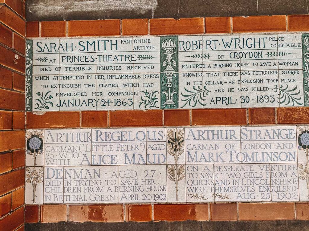 Wall plaque Postman's park earliest case is that of Sarah Smith, a pantomime artist who died in 1863