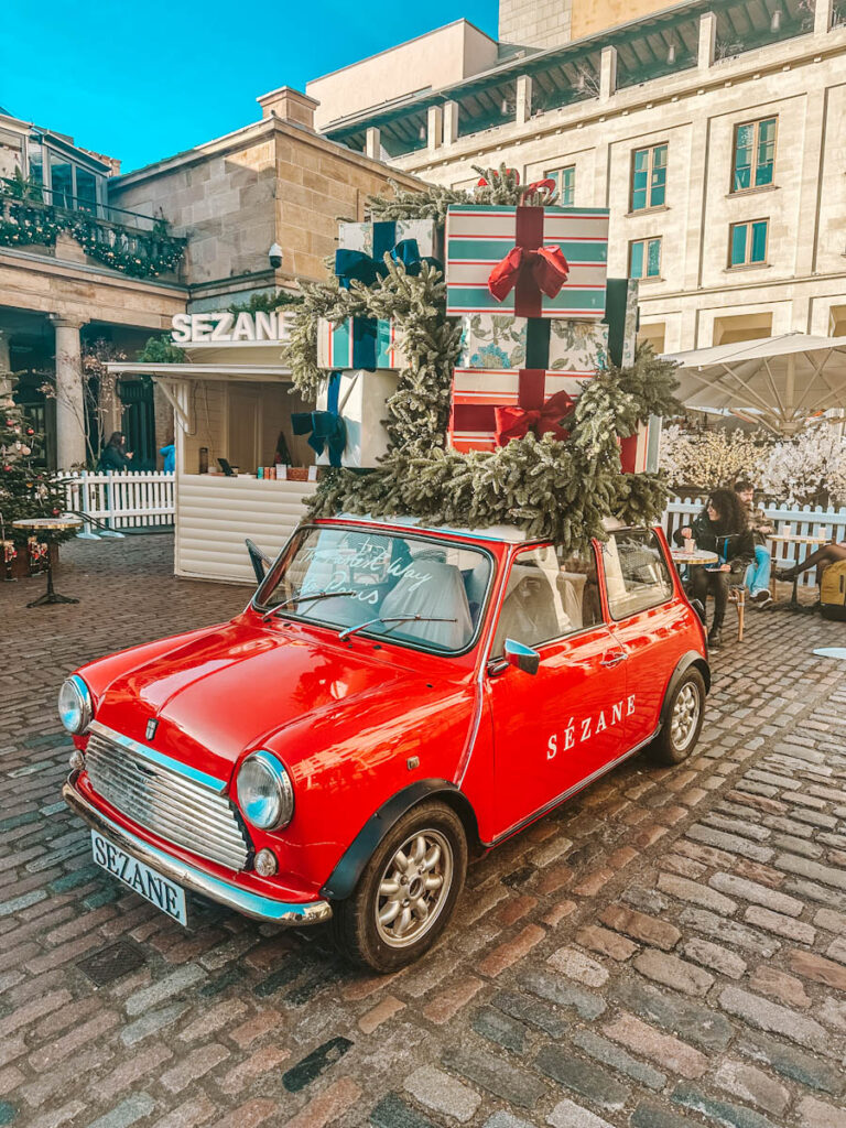 Christmas dressed Mini Cooper by Sezane Covent Garden